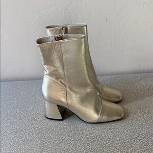 Free people “Wisteria” cap toe champagne gold booties. Never worn size 8